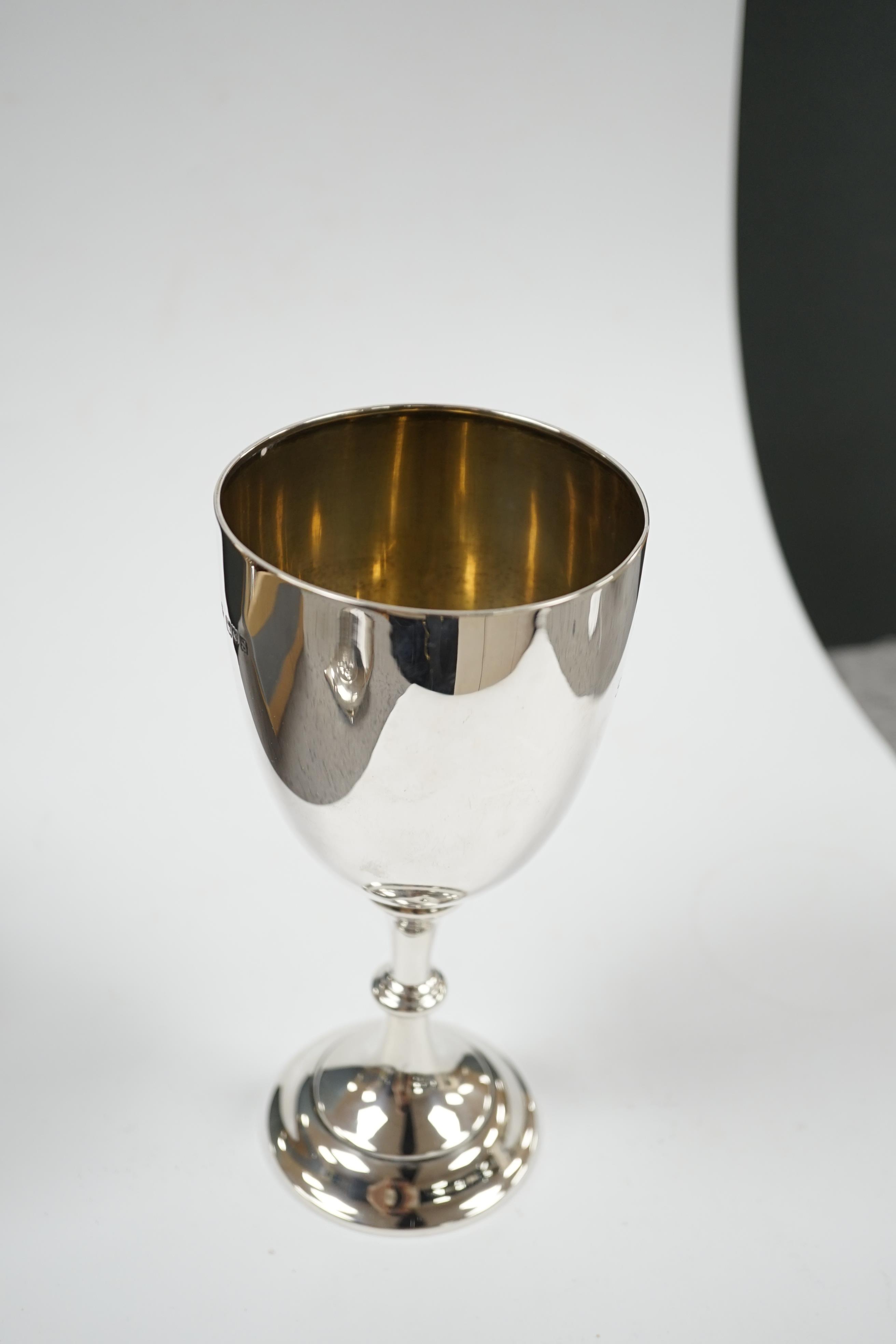 A George V silver goblet, by Charles Stuart Harris & Sons, London 1913, with engraved presentation inscription, 19.2cm, 4.5oz. Condition - fair